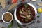 Nihari, Delicious and Spicy Tender Meat Curry with spices. top view