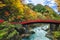 Nikko, Japan at the Shinkyo Bridge over the Daiwa River in autumn seasonNikko, Japan at the Shinkyo Bridge over the Daiwa River i