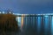 Nikolaev, Ukraine.Europe. - 04.04.2021. Night city view, luminous buildings and bridge