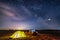 Nikolaevka, Russia - May 04, 2019: Night camping at the river. Star trails around the Polar Star