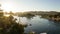 Nile river bank in Egypt sunset sky and palm tree with sand dessert slope in the back