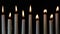 Nine Flickering White Taper Candles Loop