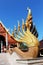 nine head naga mounted on the ladder in Thai temple