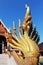 Nine head naga mounted on the ladder in Thai temple