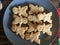 Nine Human shaped cookies in Plate