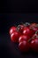 Nine red tomatoes in atmospheric light