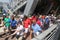 Nineteen times Grand Slam Champion Roger Federer of Switzerland walking toward Grandstand stadium surrounded by tennis fans