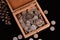 Ninety Percent Silver Coins in Box with Pine Cone