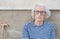 Ninety years old grandma portrait outdoors