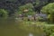 Ninh Binh, Vietnam. Traditional houses and lush lake front