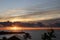 Ninini Lighthouse at sunrise and Oahu with 2 cruise ships at Nawiliwili