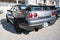 ninth-generation Nissan Skyline GT R33 at a Japanese sports car meet.