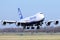 Nippon Cargo landing on Amsterdam Schiphol Airport, Boeing 747