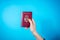 NIS, SERBIA - MAY 18, 2016: Woman hand holding Serbian passport