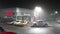 Nissan automobile dealership with fully smog at night scene