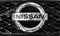 Nissan car logo on a front radiator grille