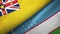 Niue and Uzbekistan two flags textile cloth, fabric texture