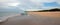 Nivali beach with boat and streaky sand patterns in Trincomalee Sri Lanka