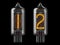 Nixie tube indicator. Number 1 one and 3 two on black background