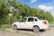 Nizhny Novgorod, Russia. - September 06.2016. A white passenger car with a disabled driver sign on the rear window is parked in a