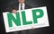 NLP poster is held by businessman
