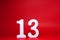 No. 13  thirteen  Isolated red  Background with Copy Space - Lucky or unlucky Number 13% Percentage or Promotion - Discount or a