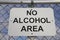 No alcohol area -signage on a wired fence