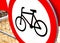 No bikes allowed, round red warning biking prohibition sign, simple symbol object detail, closeup, nobody. No bicycles, bikers
