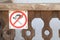 No burning - warning sign mounted on wooden wall - concept for forbidden to use open fire and smoke