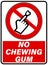 No chewing gum. Prohibition sign with a finger sticking an old chewed up gum on a surface.