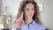 No, Curly Hair Woman Rejecting Offer by Waving Finger