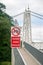 â€œNo cyclingâ€ sign with inscript â€œCyclists please dismountâ€ on the pedestrian bridge