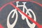 No cycling zone symbol on pavement