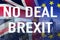 No Deal BREXIT conceptual image of text over London image and UK and EU flags symbolising destruction of agreement