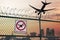 No drone zone sign near airport warning about restricted no fly area. 3D rendered illustration.