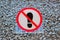 No footprints plastic sign on stone surface, modern security,