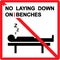 No laying down on benches Sign