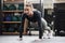 No more excuses, start working for it. an athletic young woman doing push-ups at the gym.