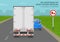 No overtaking by heavy goods vehicles sign meaning. Back view of semi-trailer on road.