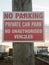 No parking private car park no authorized vehicles sign on post