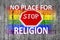 No place for RELIGION and STOP sign and LGBT flag painted on texture concrete background