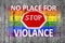No place for violance and STOP sign and LGBT flag painted on background
