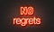 No regrets neon sign on brick wall background.