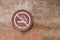 No smoking label put on old cement wall background