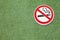 No smoking sign on green grass ,health