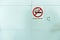 No smoking signs white plastic in building at international airport terminal