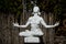 No stress. Woman Yoga - relax in nature. Statue of a woman who is meditating as seen in Canyon Road Street in Santa Fe