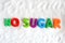 No sugar text on white refine sugar as background