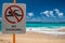No swimming sign in Hawaii Poipu beach landscape