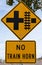 No train horn sign at a railroad crossing